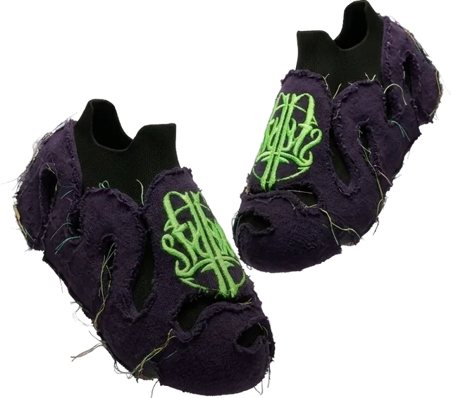 A pair of purple slip-on shoes with a fuzzy outer layer, cut-outs and a lime-green logo on top.